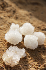 Natural salt of Dead Sea on sand