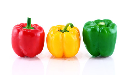 Green, red, yellow pepper is isolated on a white background