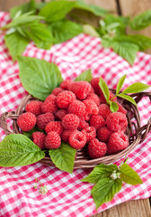  Ripe raspberry with leaf