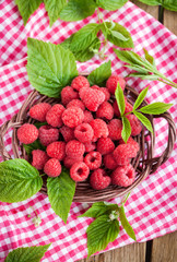  Ripe raspberry with leaf