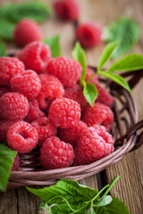  Ripe raspberry with leaf