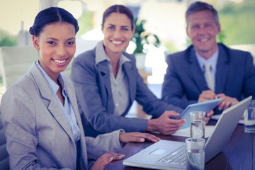 Business people looking at camera 