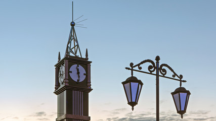 Clock tower on white night sky background