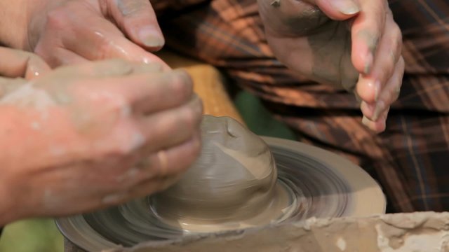 He teaches the craft apprentice potter