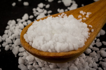 Sea Salt In Wooden Spoon