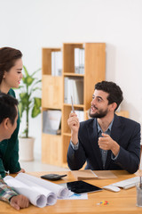 Business executive talking to colleagues