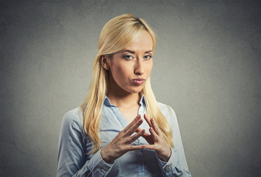 Sneaky, Sly, Scheming Young Woman Plotting Revenge Plan