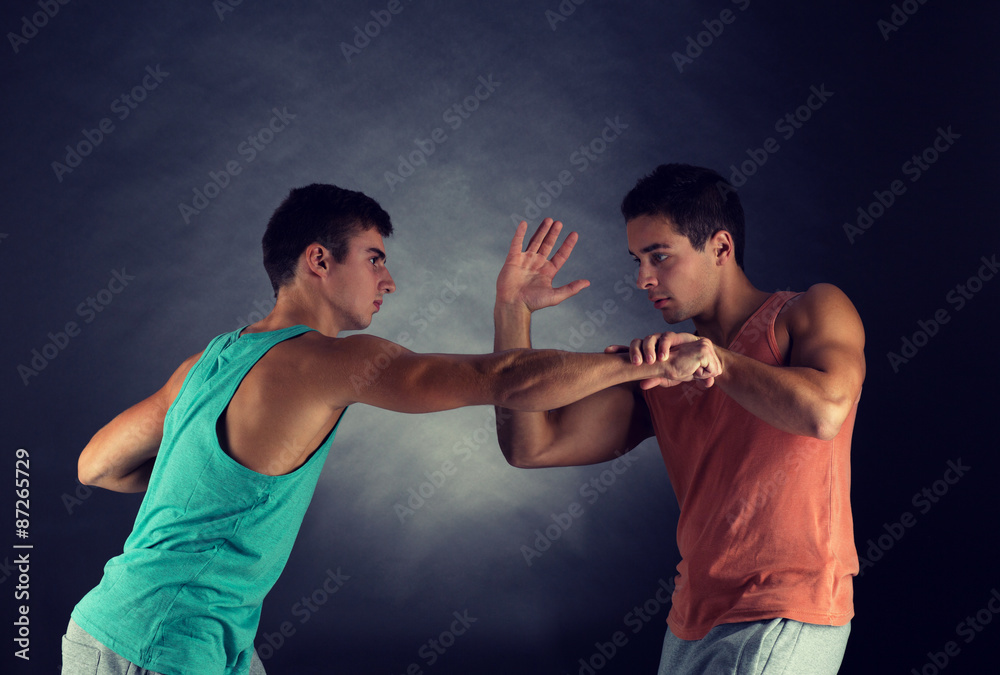 Canvas Prints young men wrestling