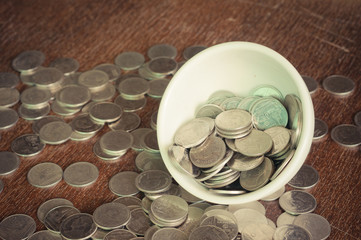 Coin in the cup with filter effect retro vintage style