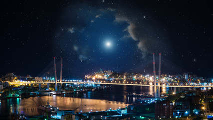 Fototapeta premium City landscape at night with sky with stars and nebula.