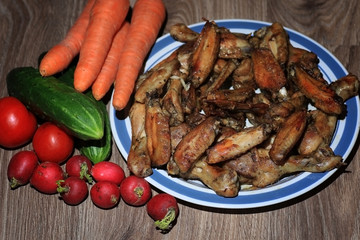 chicken wings and drumstick served with