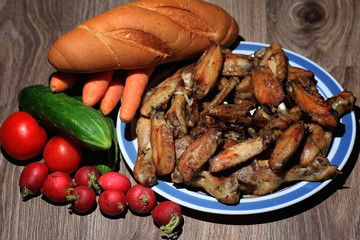 chicken wings and drumstick served with