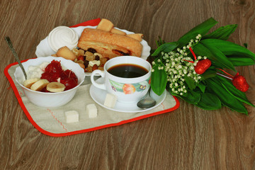 Breakfast with coffee and cream dessert