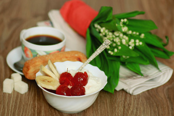 Breakfast with coffee and cream dessert