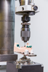 production dentures drill in action