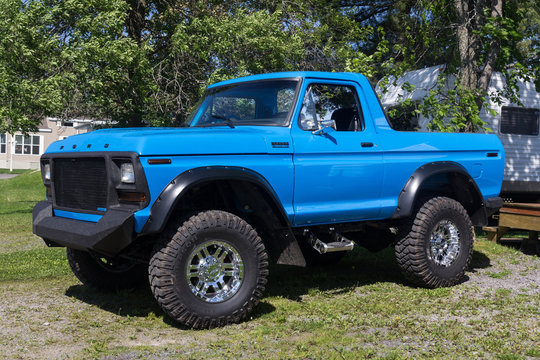 St-Gabriel-de-Brandon, Canada - June 13, 2015: rebuilt Ford Bronco Ranger 4x4 blue modified 1979 on the grass