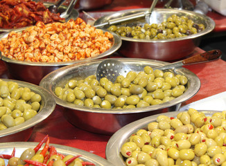A Collection of Various Olives Displayed for Sale.