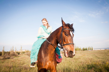 Fototapeta premium Horsewoman and blue sky