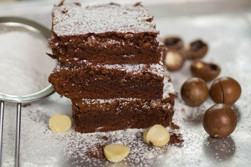 Brownie. Chocolate cakes with  macadamia