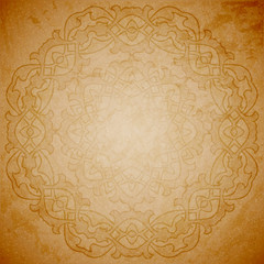 Aged paper background with round ornament