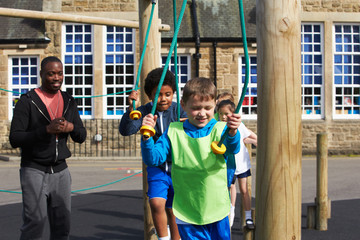 Group Of Children In School Physical Education Class