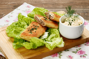 Delicious croquettes with meat and mayonnaise dip.