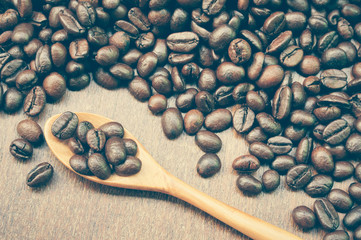 Coffee beans and wooden spoon with filter effect retro vintage s