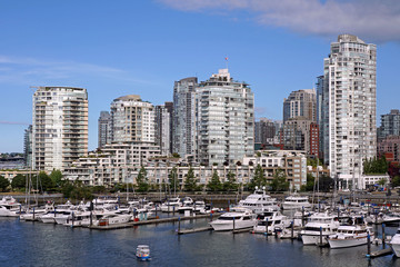 Fototapeta na wymiar Vancouver waterfront apartment buildings and marina