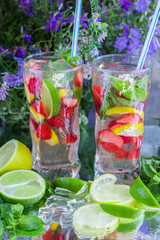 Homemade lemonade. Summer refreshing drink of strawberries, lemo