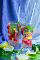 Homemade lemonade. Summer refreshing drink of strawberries, lemo