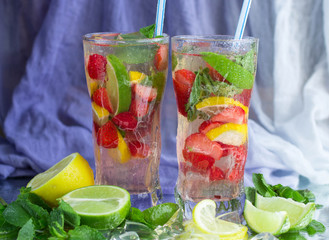 Homemade lemonade. Summer refreshing drink of strawberries, lemo