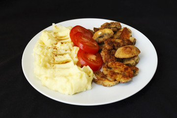 champignons fried mashed potatoes white plate