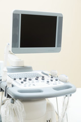 Interior of medical room with ultrasound diagnostic equipment