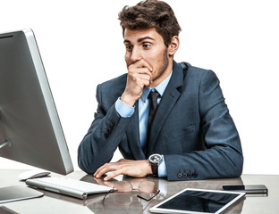 Operator looking at computer screen with horror 