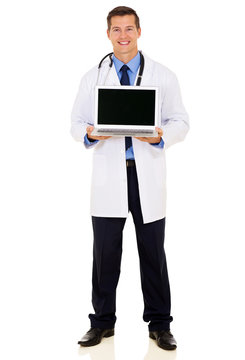 Young Doctor Showing Laptop Blank Screen