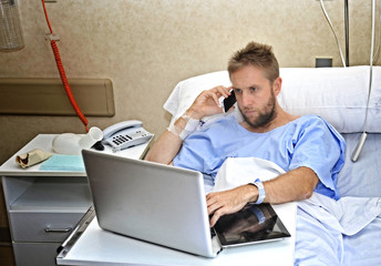 workaholic businessman in hospital room sick working with computer laptop - obrazy, fototapety, plakaty
