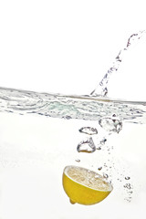 lemon falls into the water