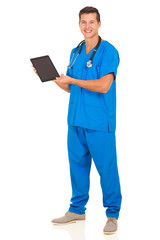 male doctor showing tablet computer screen