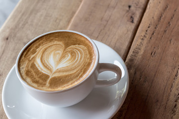 Cappuccino or latte coffee .