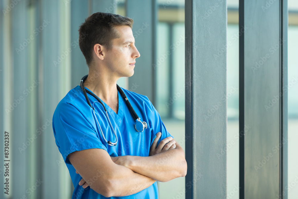 Wall mural doctor looking through office window