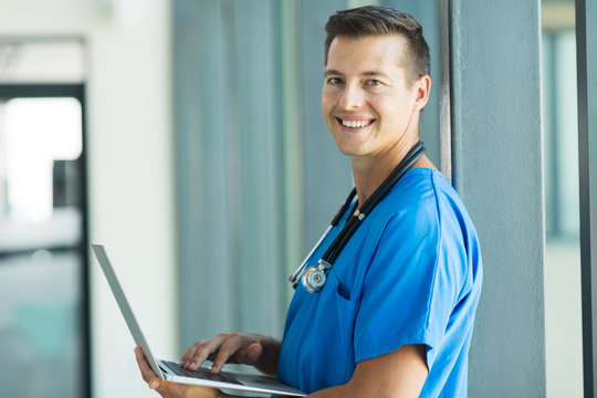 Young Nurse Working On A Laptop