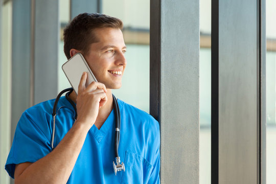 male nurse talking on mobile phone