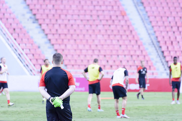 Football practice in stadium