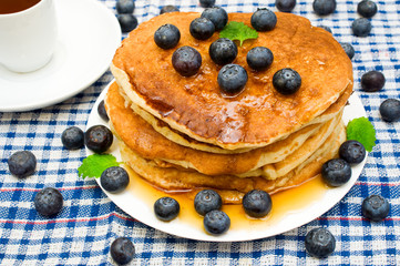 pancakes with berries and tea