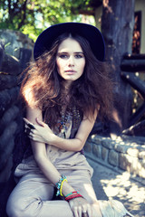 Outdoor fashion portrait of young beautiful woman.