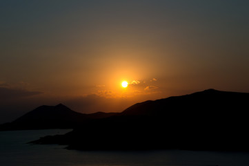 sunset over the islands