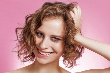 Fototapeta premium Smiling beautiful girl closeup portrait