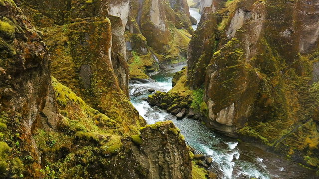 Aerial View Through Green Mountain River Canyon in Iceland.