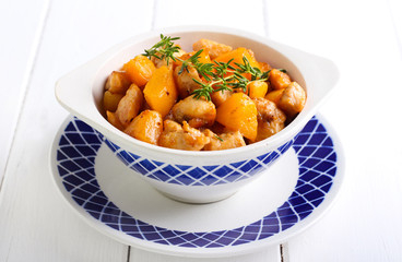 Chicken breast with apricot in a bowl