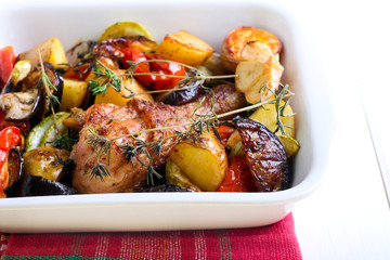 Baked vegetables and chicken drumstick